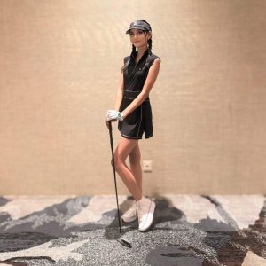 TG-GD-035 | Ladies sleeveless golf dress black with zipper mock polo neck and white overlock stitching